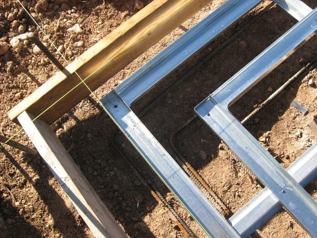 Footer track installation