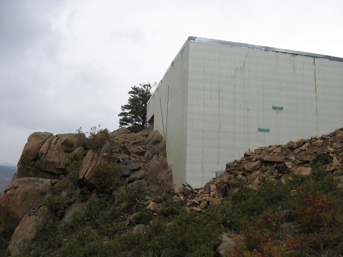 Quad-Lock ICF Home Built on the Rocks - fitting into the rocks - Energywise Sustainable Products CO