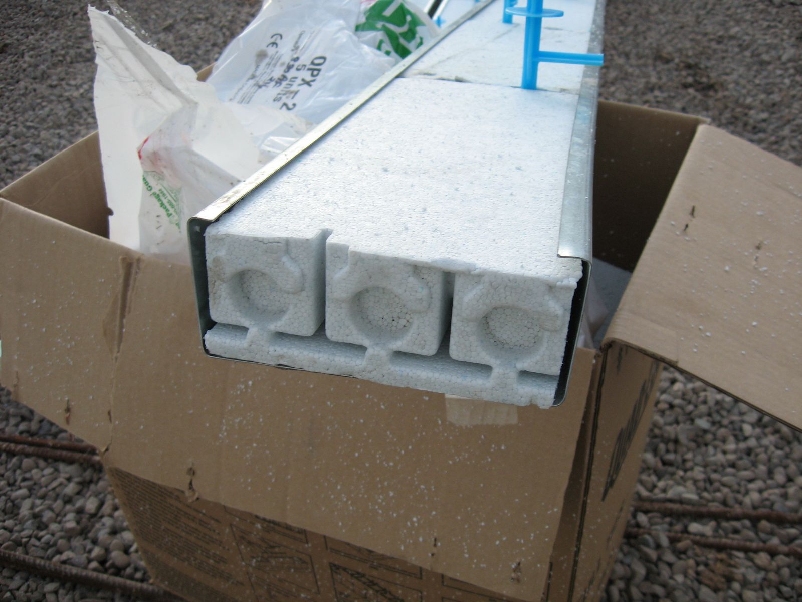 Structural steel door bucks with Quad-Lock insulation inserts for garage doors