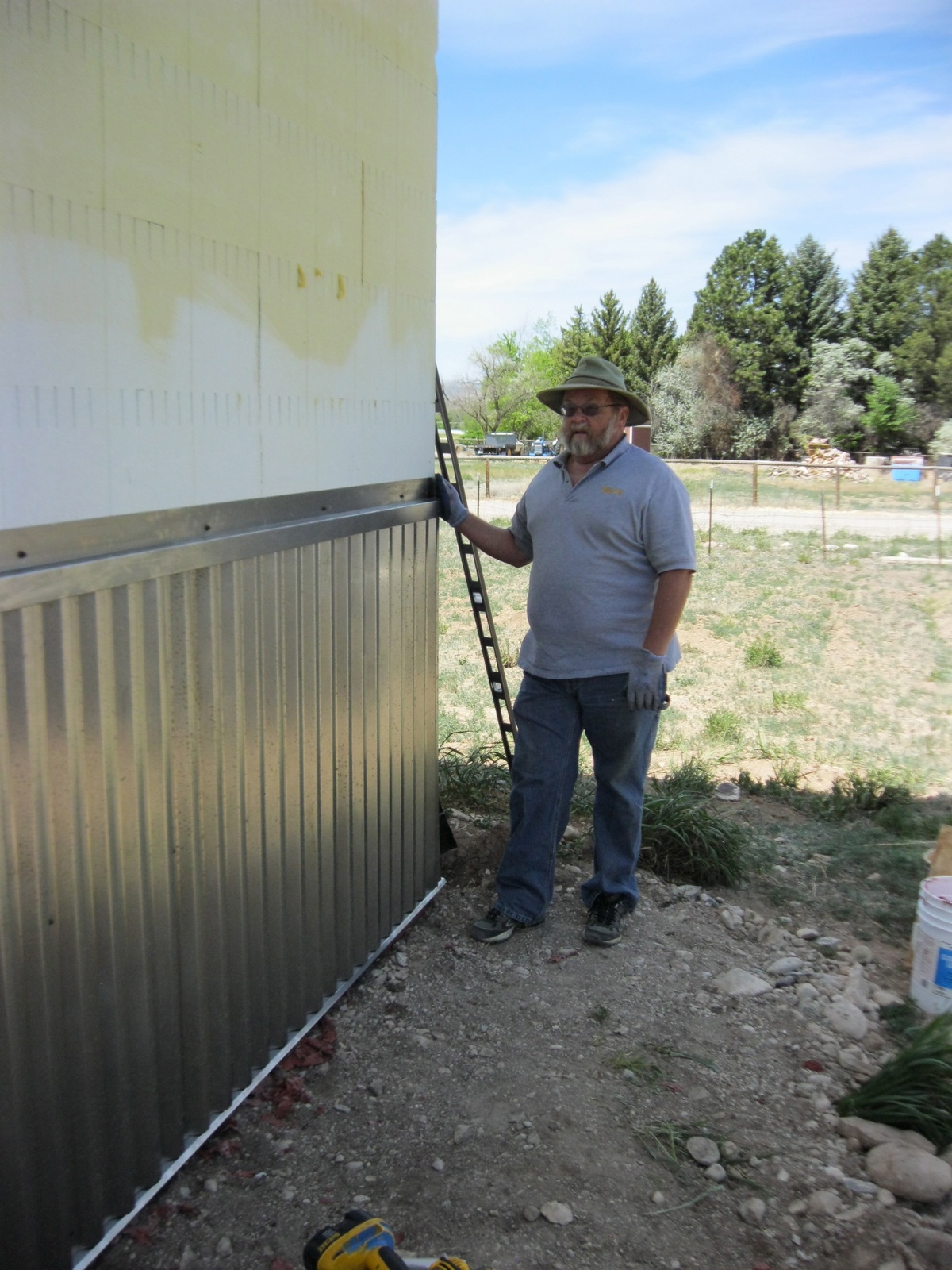 Exterior rusty metal wainscot application