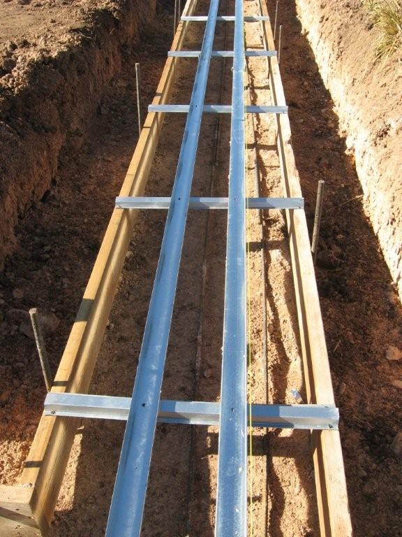 Footer track installation