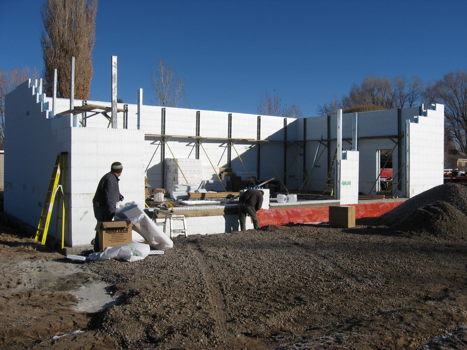 Stacking Quad-Lock ICF walls and applying waterproofing